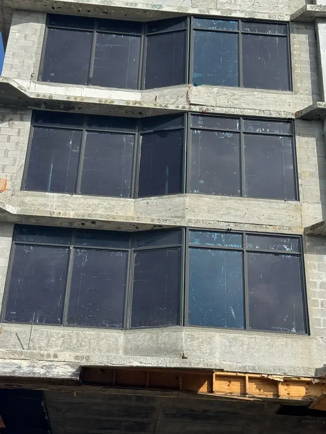 Multi-story building with impact windows installed
