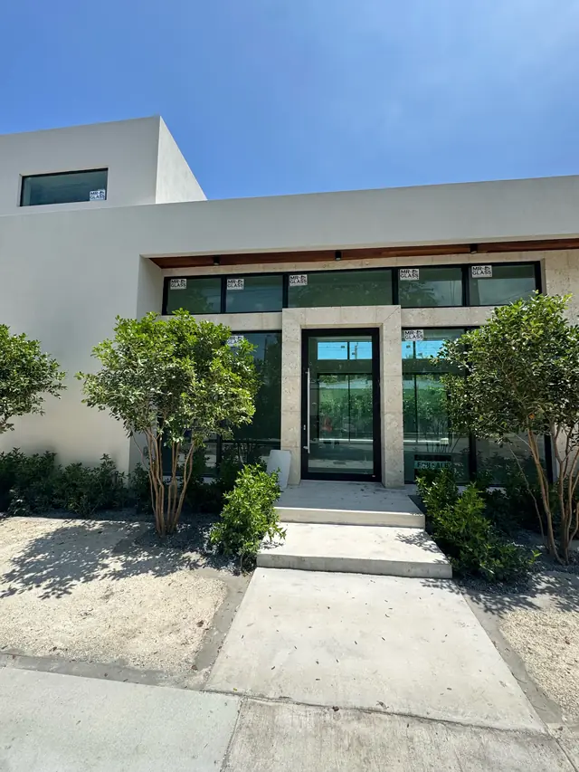 Commercial storefront with impact glass door and windows